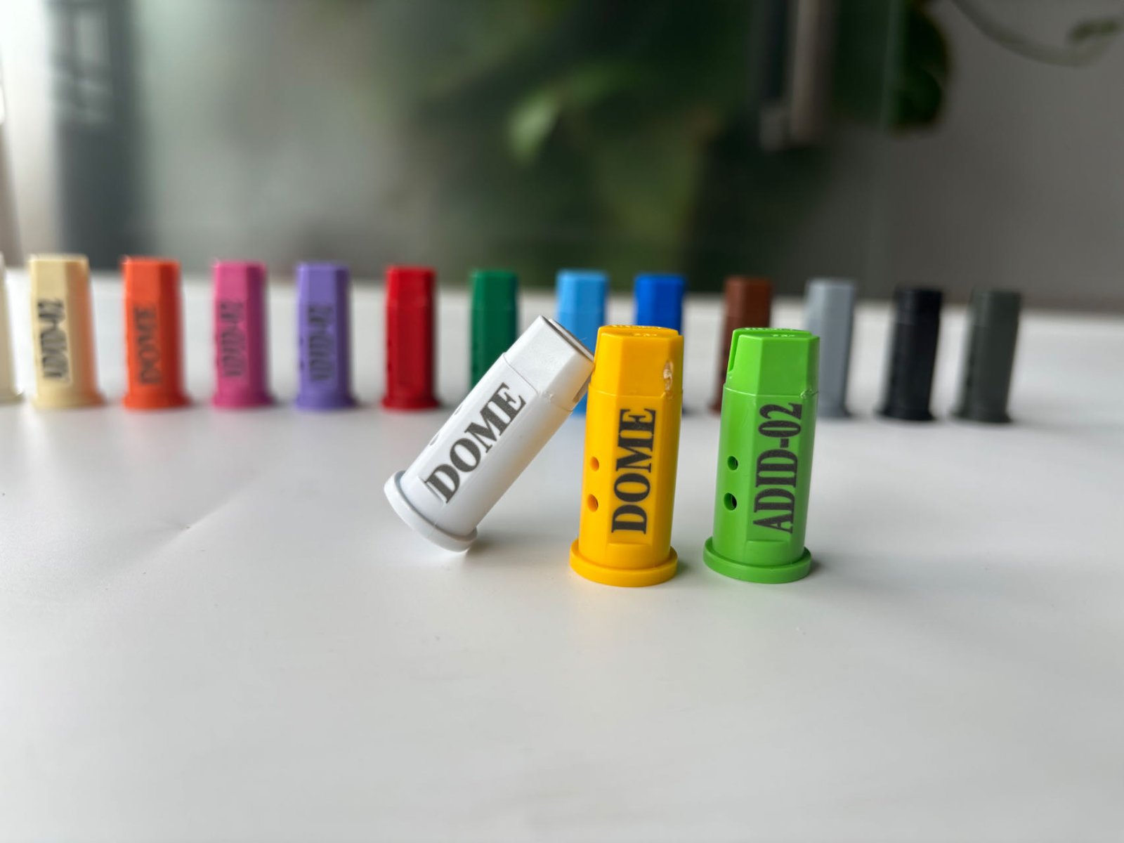 black laser marking on colored pom molded for plastic nozzles for special agricultural