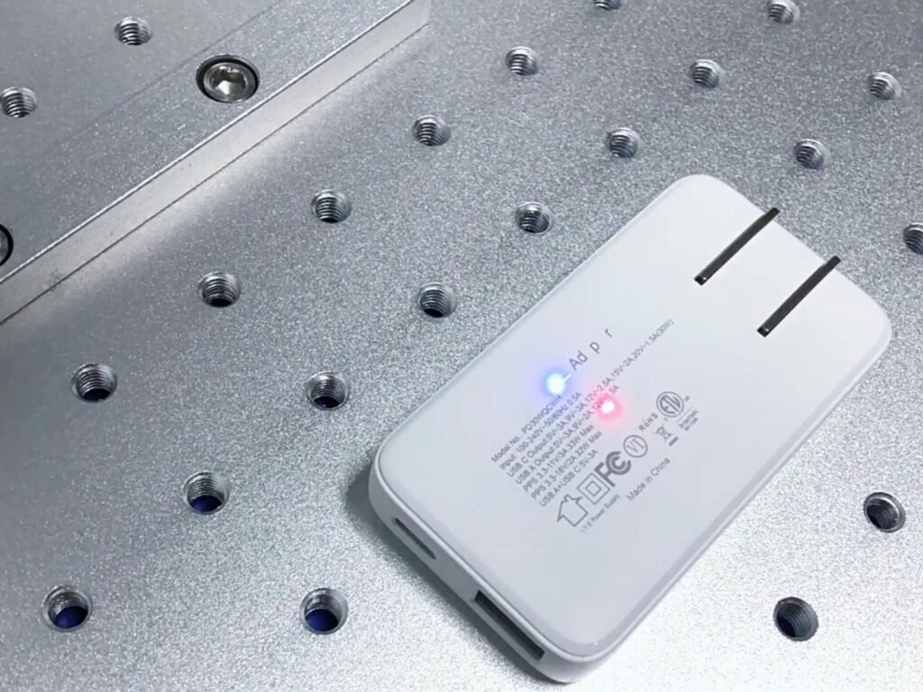 Black laser marking on power adaptor UV laser