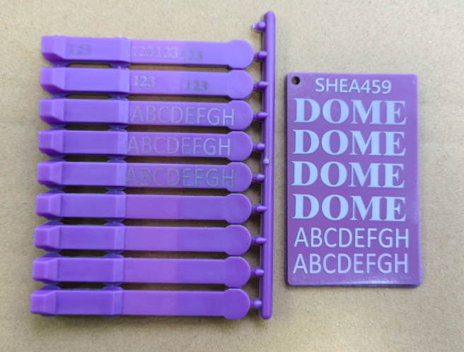 white laser marking on purple molded pa
